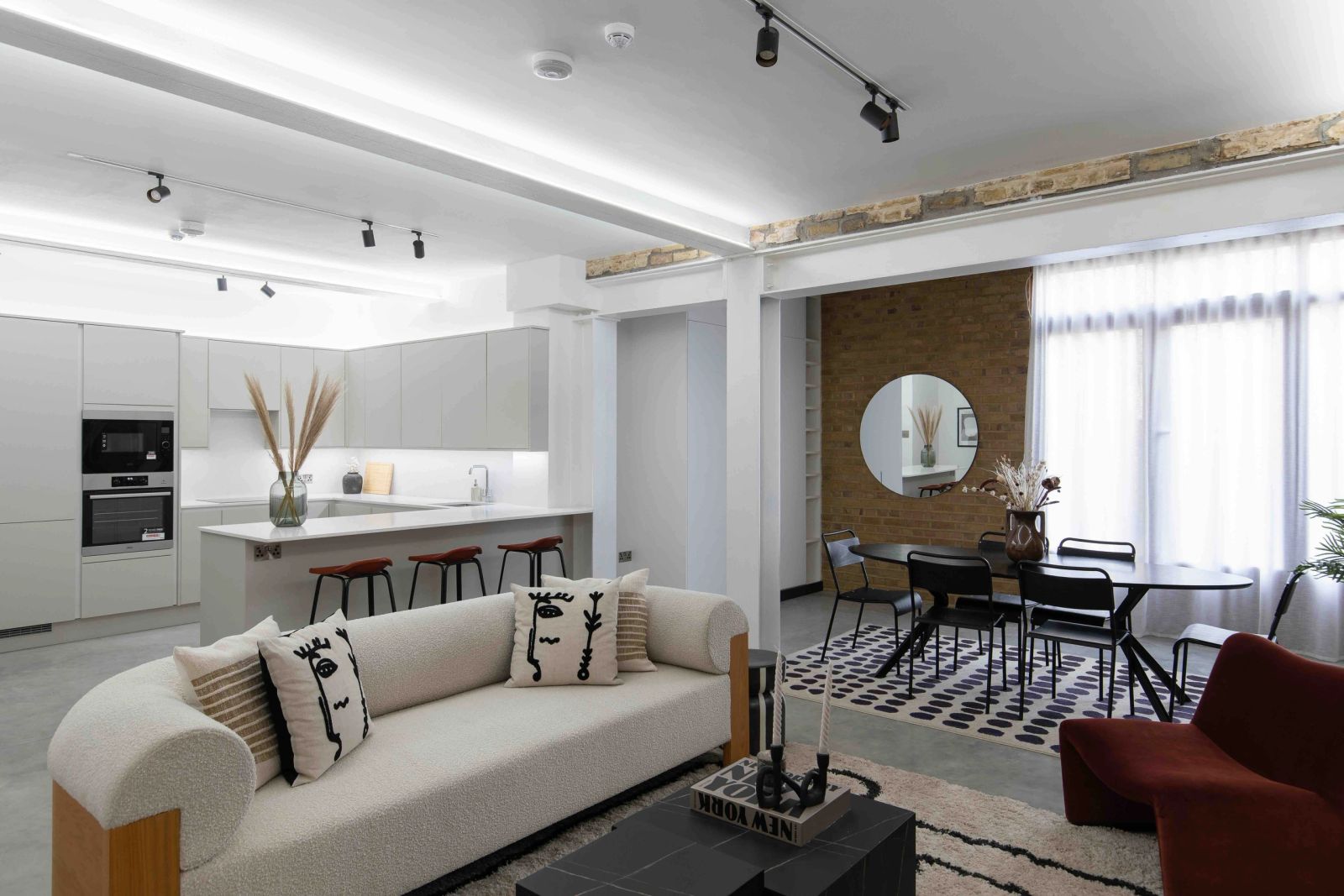 Open-plan living space with layered lighting